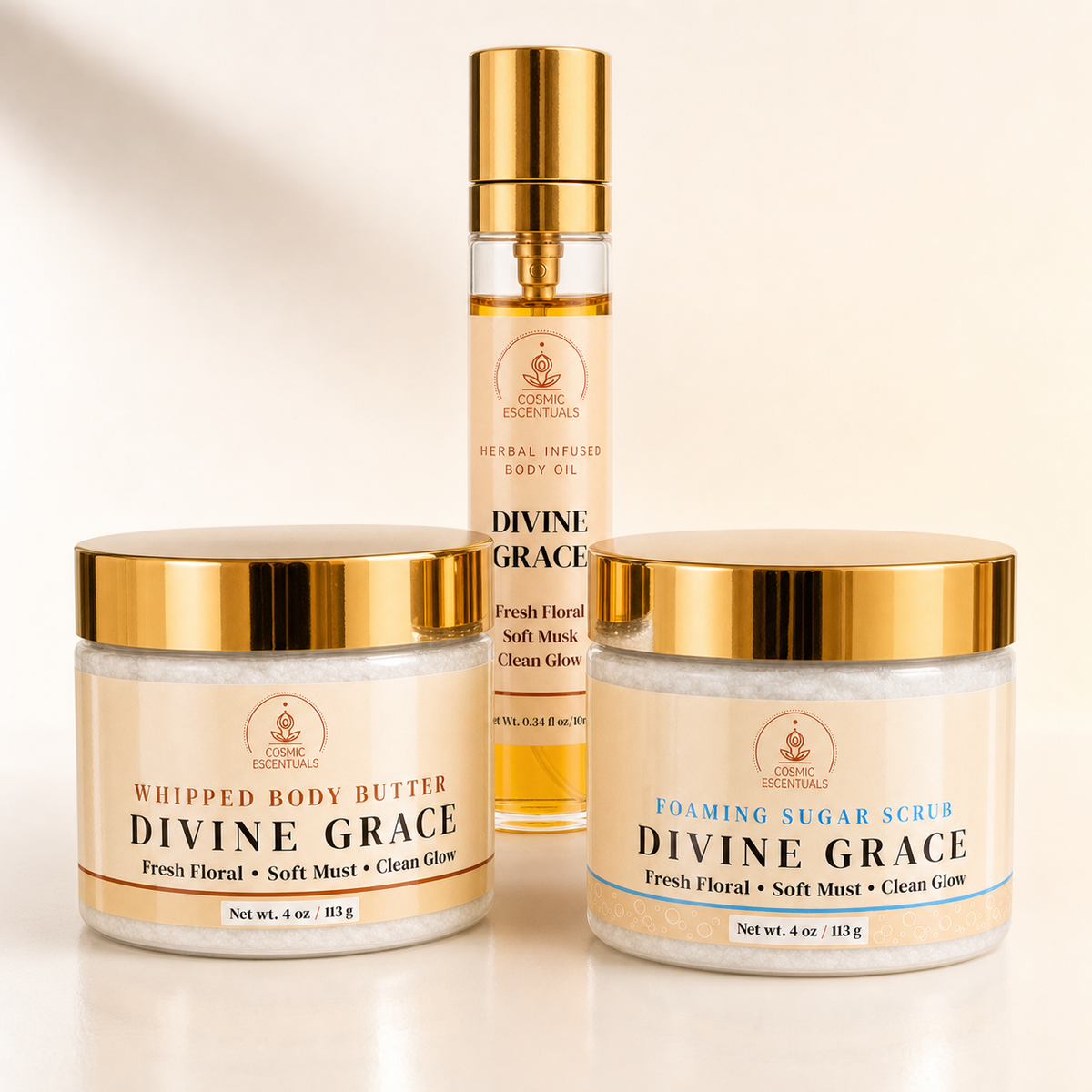 Divine Grace Bundle featuring the Whipped Body Butter, Foaming Sugar Scrub, and Herbal Body Oil Spray set together.