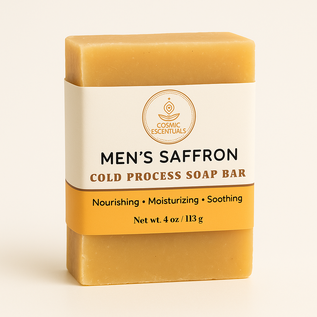 Men's saffron cold process soap bar with Cosmic Escentuals branding on a beige background