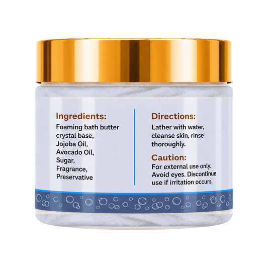 A jar of foaming bath butter with a shiny gold lid and a white label featuring blue accents and product instructions.