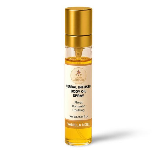 Herbal infused body oil spray bottle with gold cap on a white background