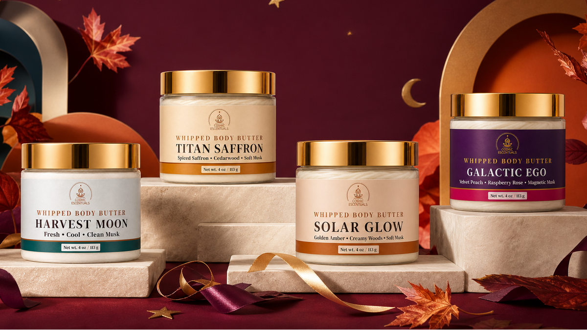 Harvest Moon, Titan Saffron, Solar Glow, and Galactic Ego whipped body butters in a festive fall Cosmic Escentuals setting
