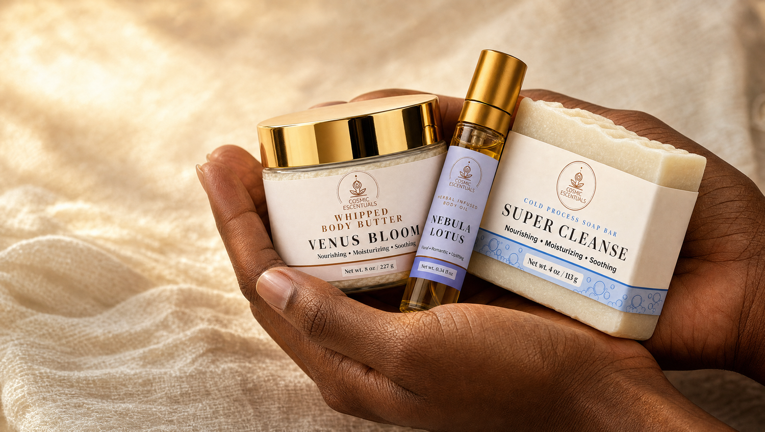 Hands holding Venus Bloom body butter, Nebula Lotus oil and Super Cleanse soap
