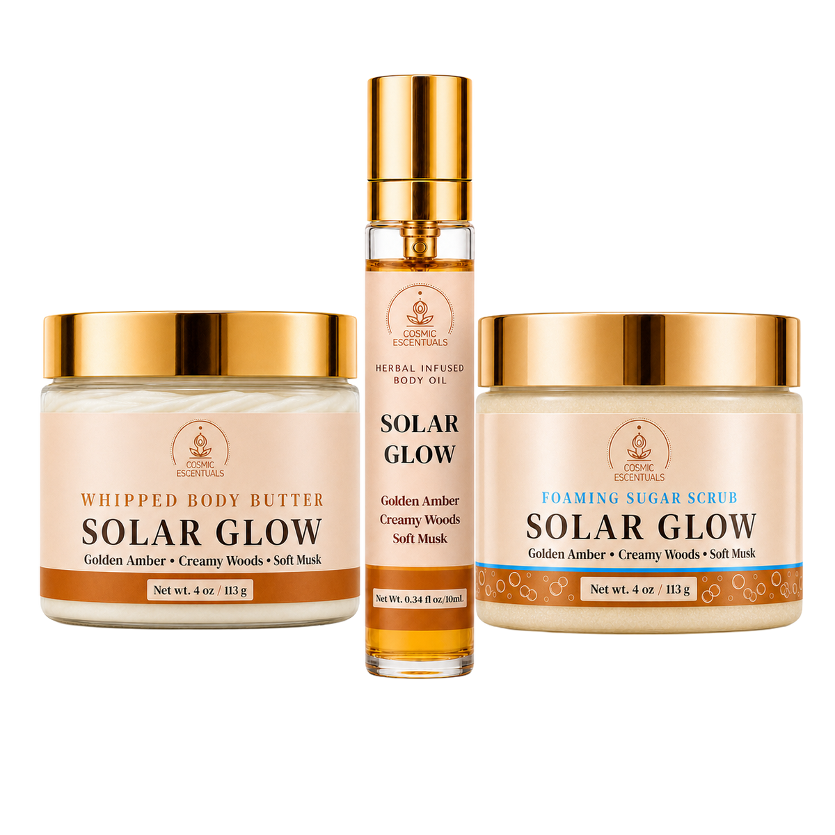 Cosmic Escentuals Solar Glow skincare products arranged together on a white background: a whipped body butter jar, a body oil spray bottle, and a foaming sugar scrub jar, all with gold caps and peach labels.