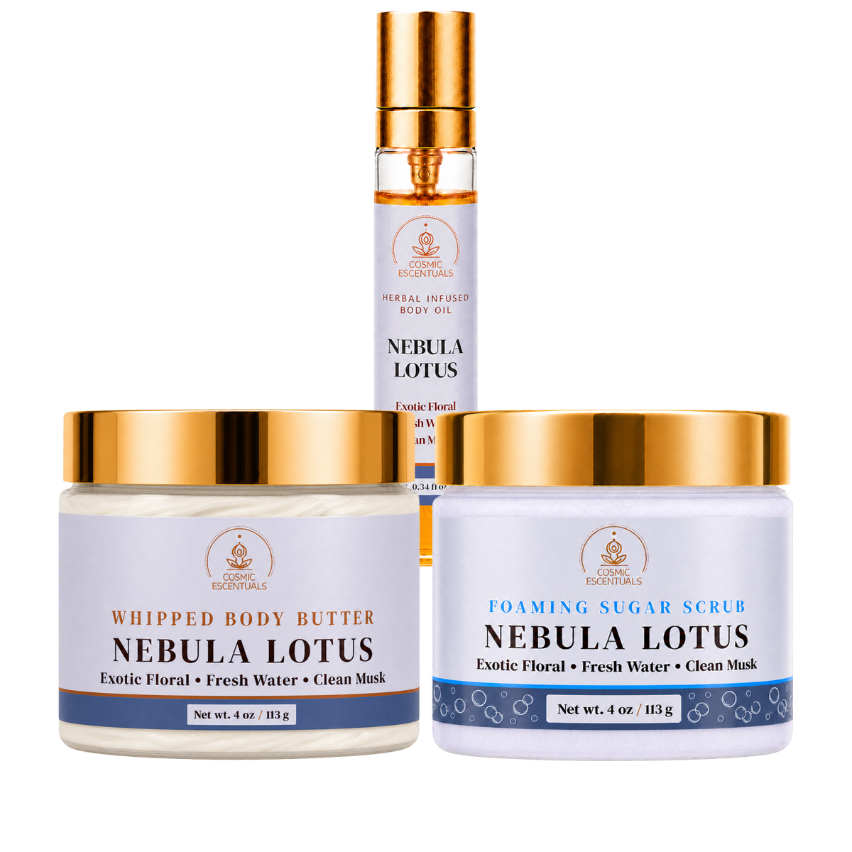 Three skincare products from Cosmic Escentuals Nebula Lotus line arranged together on a white background: a whipped body butter jar, a foaming sugar scrub jar, and a body oil bottle.