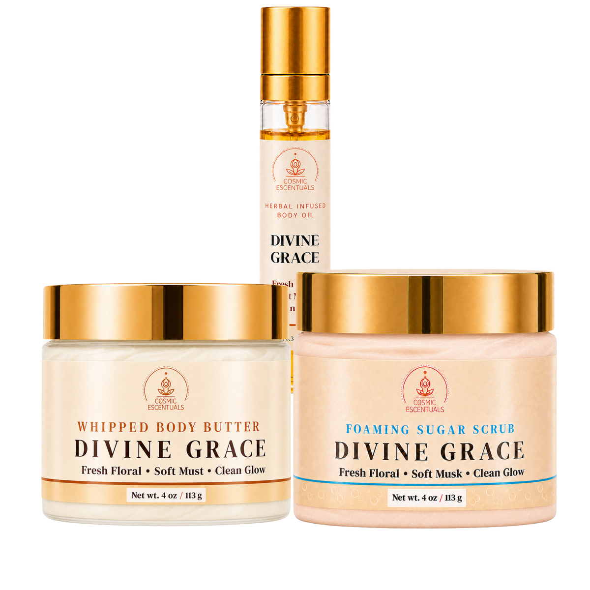 Three skincare products from Cosmic Escentuals arranged on a white background: a whipped body butter jar, a foaming sugar scrub jar, and a small herbal infused body oil bottle.