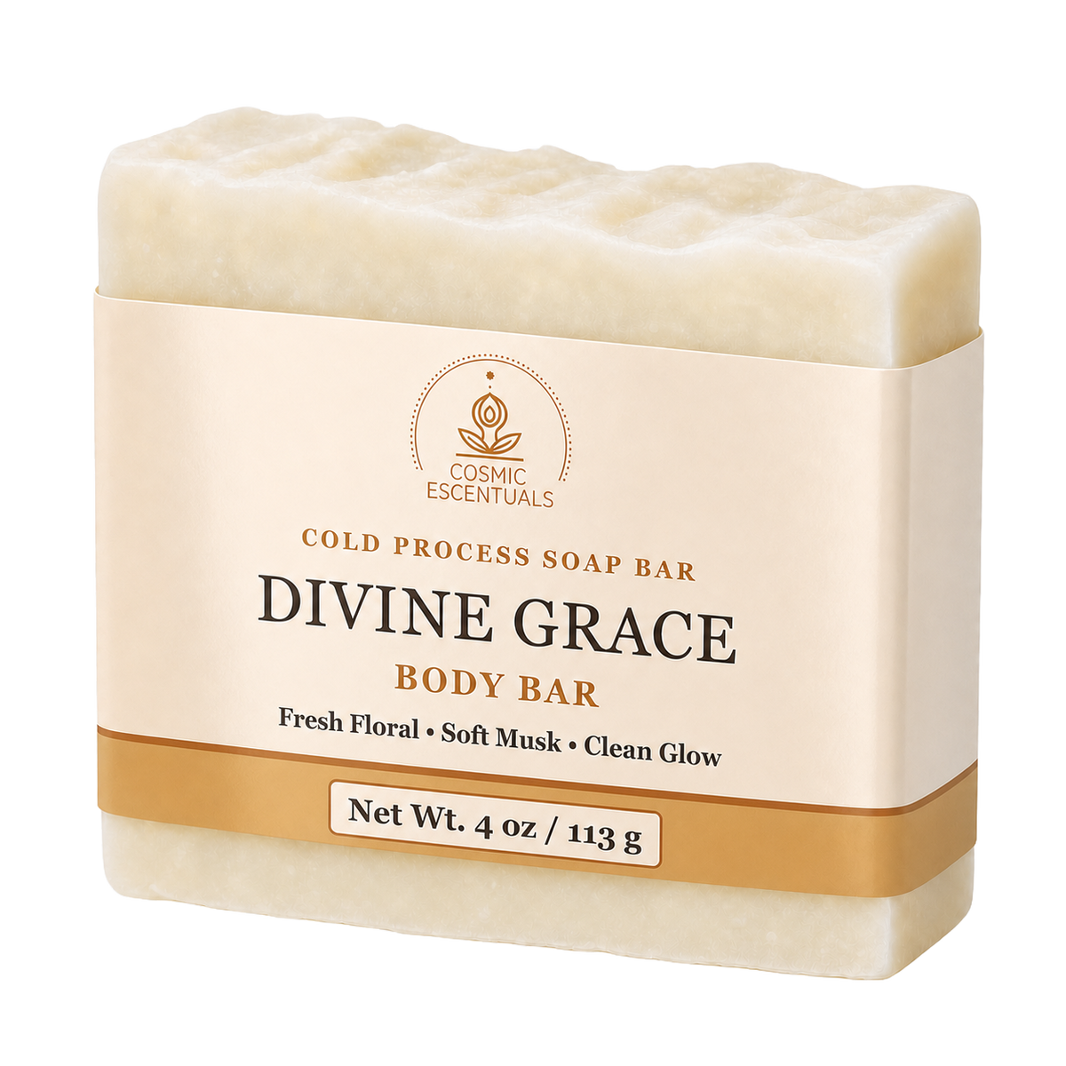 A bar of Divine Grace body soap by Cosmic Escentuals, wrapped in a cream-colored paper sleeve with gold accents, isolated on a white background.