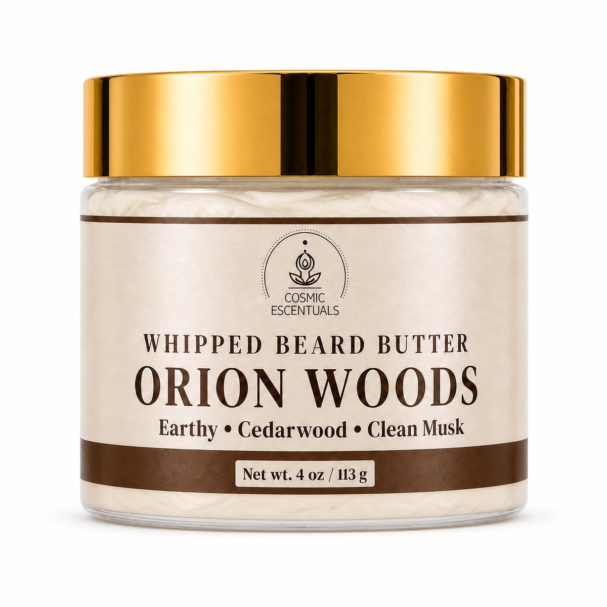 Cosmic Escentuals Whipped Beard Butter in the Orion Woods scent, in a clear jar with a shiny gold lid and a beige label, set against a plain white background.