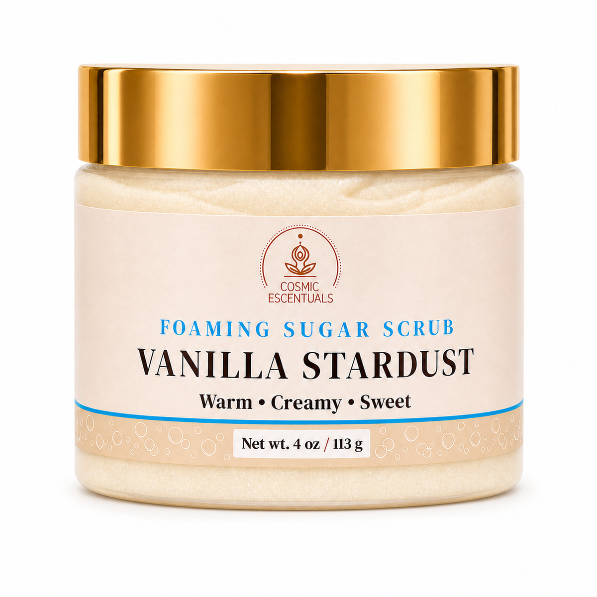 A jar of Cosmic Escentuals Vanilla Stardust Foaming Sugar Scrub, featuring a shiny gold lid and a cream-colored label with blue and black text, set against a plain white background.