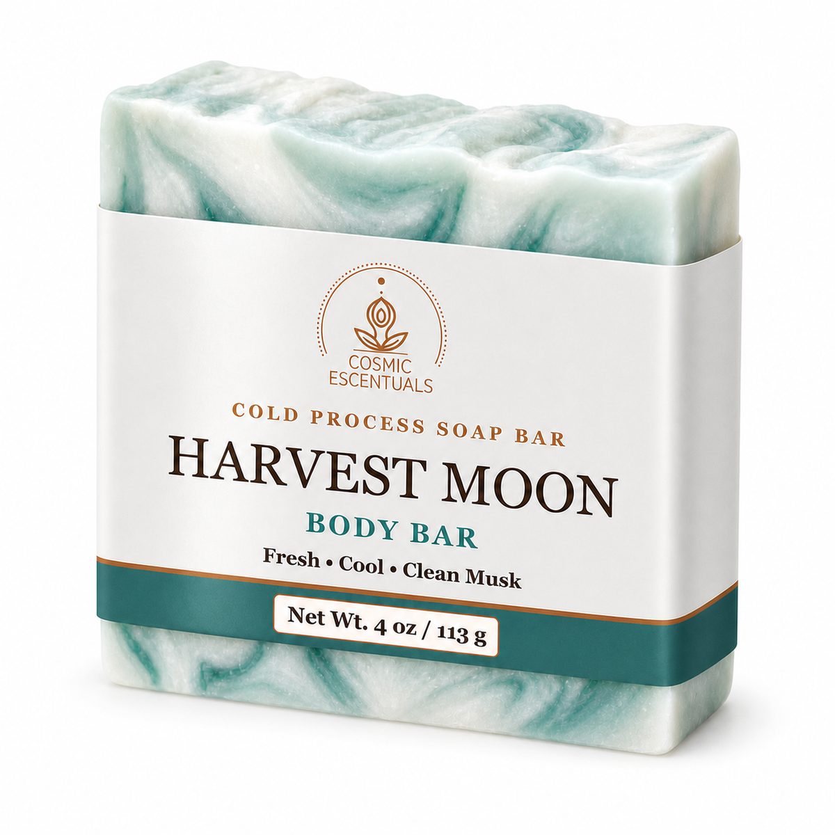 A 4 oz body bar soap from Cosmic Escentuals, named 'Harvest Moon'. The soap has a marbled pattern of mint green and white, wrapped in a white paper label with gold and teal accents.