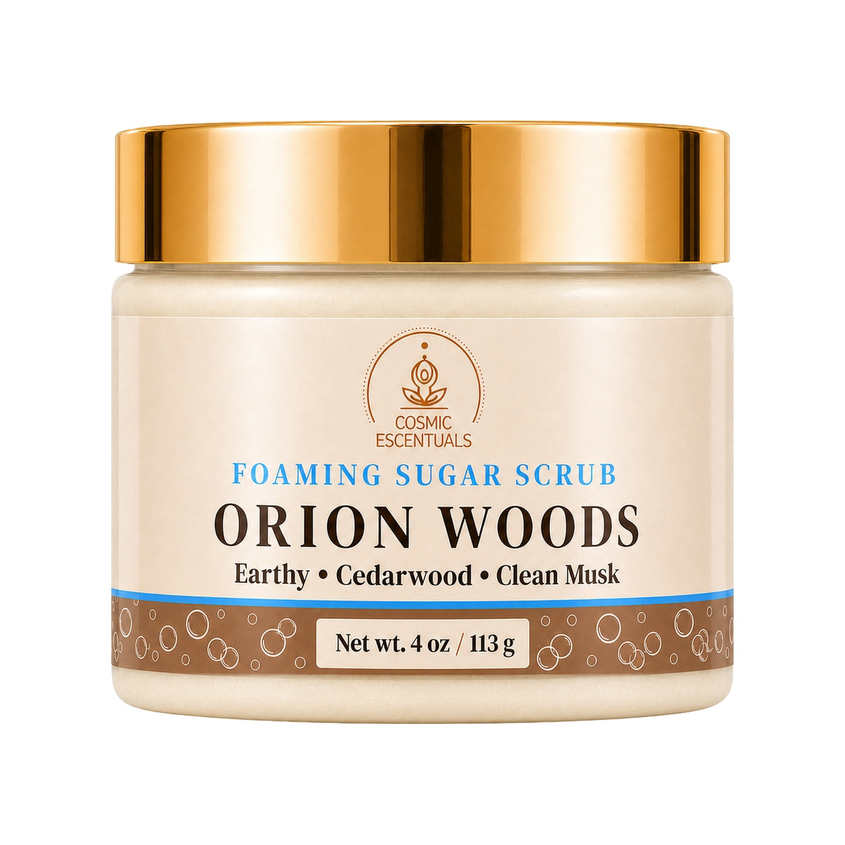 Cosmic Essentials Orion Woods Foaming Sugar Scrub in a 4 oz jar with a shiny gold lid and a cream-colored label.