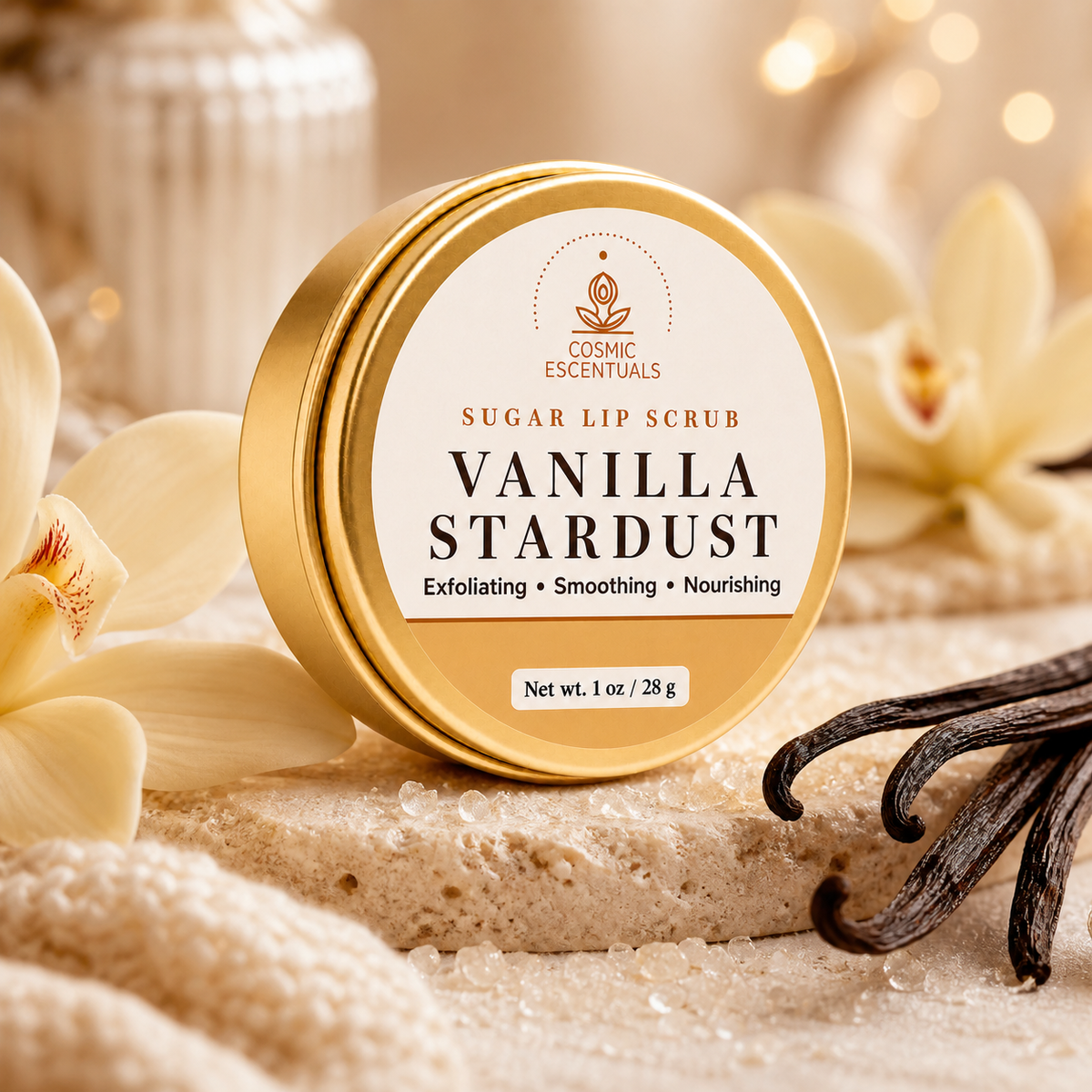Vanilla Stardust Sugar Lip Scrub in its gold tin on a travertine slab, styled with a vanilla orchid and vanilla pods.