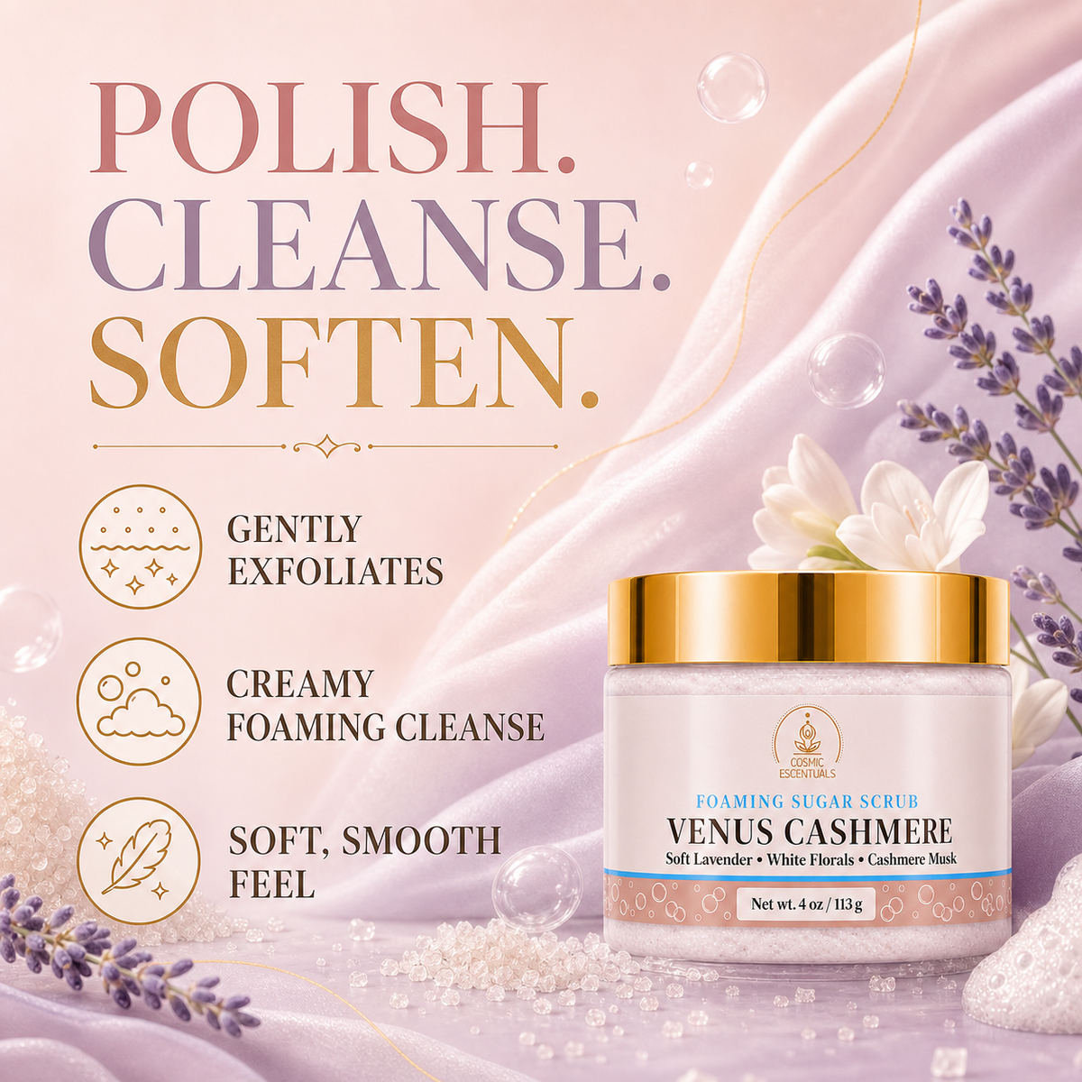 A jar of Venus Cashmere Foaming Sugar Scrub by Divine Essentials, set against a soft pink and lavender background with decorative lavender sprigs, white flowers, and bubbles. The ad includes text reading 'POLISH.