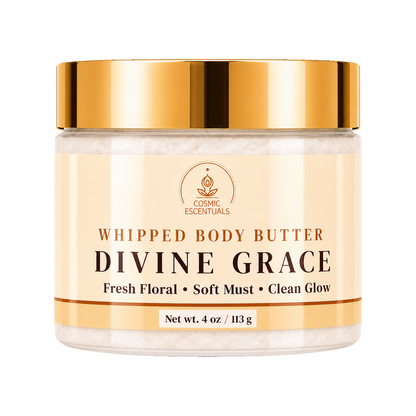 Cosmic Essentials Divine Grace Whipped Body Butter in a clear jar with a metallic gold lid and cream-colored label, set against a plain white background.