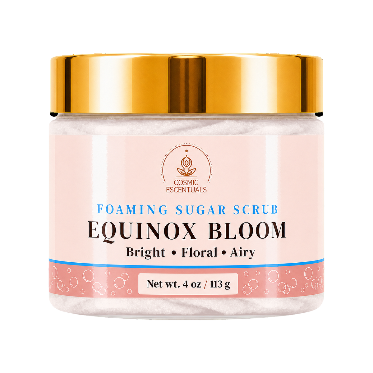 Cosmic Essentials Equinox Sugar Scrub in a clear jar with a metallic gold lid and a light pink label, set against a plain white background.