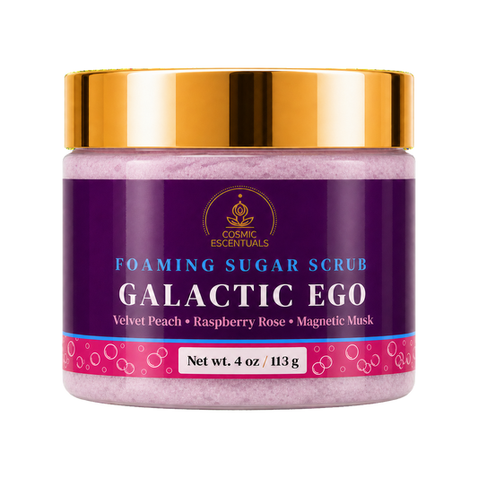 Cosmic Escentuals Foaming Sugar Scrub, Galactic Ego, 4oz jar with a shiny gold lid, shown on a plain white background.