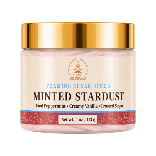 Cosmic Essentials Minted Stardust Foaming Sugar Scrub in a 4 oz jar with a shiny gold lid and cream-colored label.