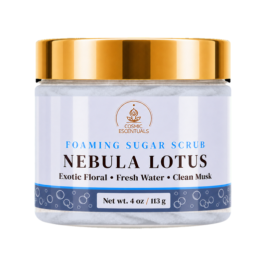 Cosmic Essentials Nebula Lotus Foaming Sugar Scrub in a 4 oz jar with a shiny gold lid and a white label featuring blue and black text.