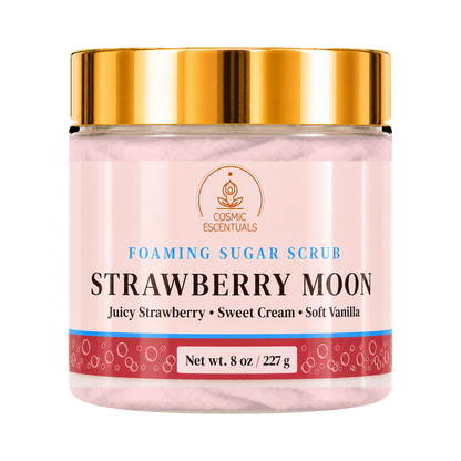 Cosmic Essentials Strawberry Moon Foaming Sugar Scrub in a 8 oz clear jar with a shiny gold lid and a pink label.
