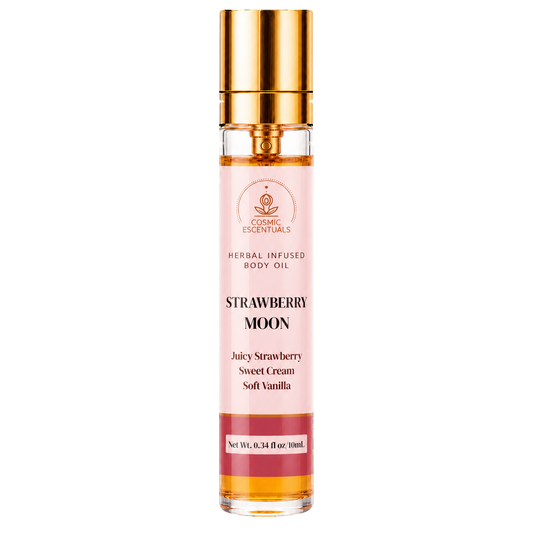 Cosmic Essentials Strawberry Moon Herbal Infused Body Oil in a clear glass bottle with a shiny gold cap and a pink label, shown on a plain white background.