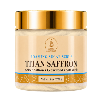 Cosmic Essentials Titan Saffron Foaming Sugar Scrub in an 8 oz jar with a shiny gold lid and a beige label.