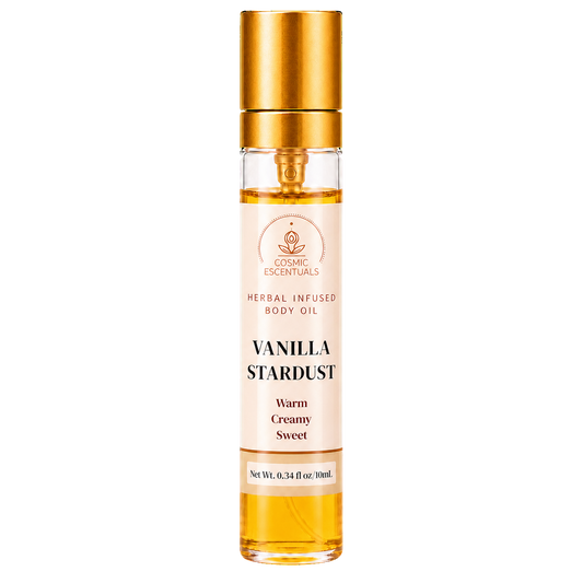 A 10ml glass bottle of Vanilla Stardust herbal infused body oil by Cosmic Essentials, featuring a metallic gold cap and a cream-colored label with black text.