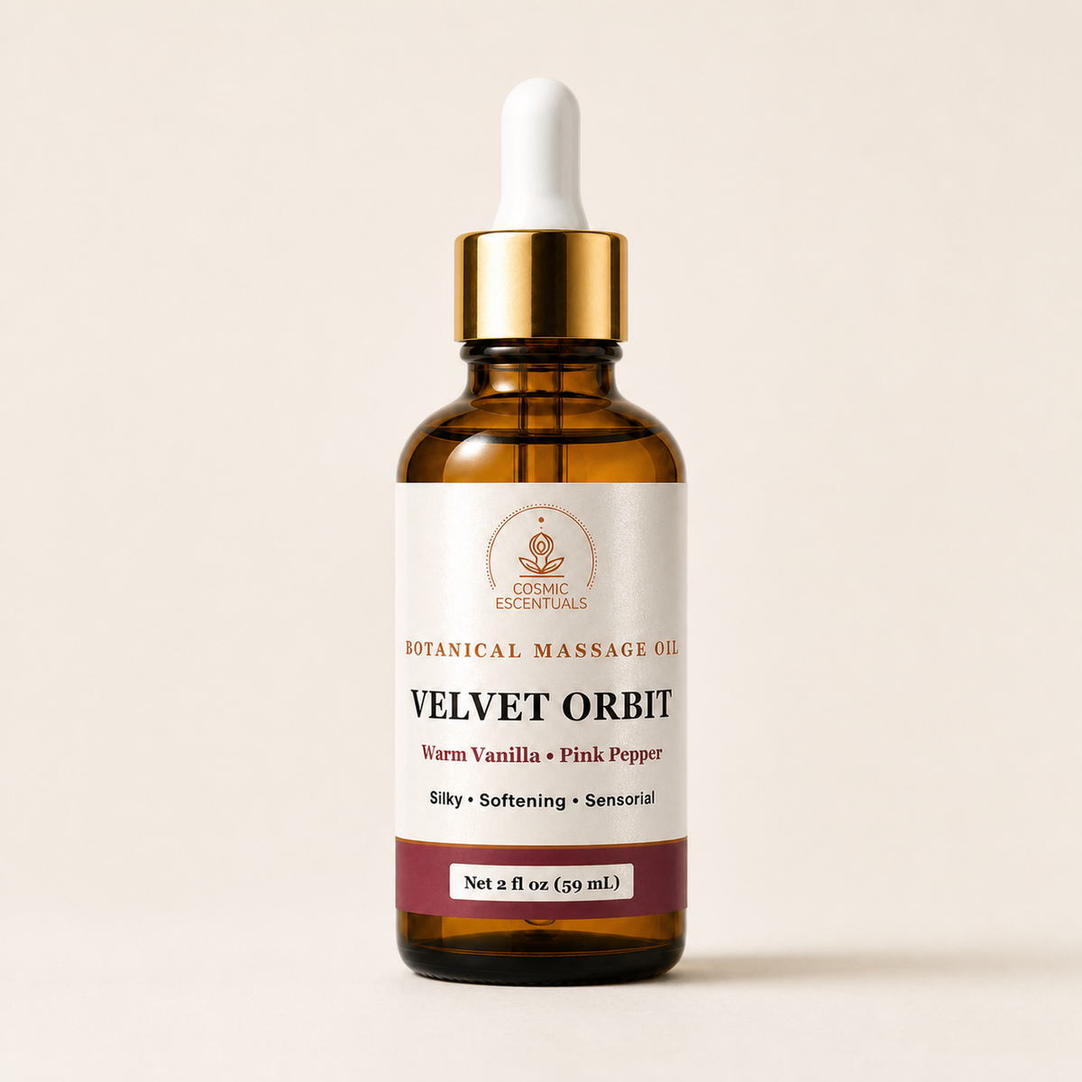 Velvet Orbit botanical massage oil in a 2 oz amber dropper bottle, shown with its semi-gloss pigment-ink label in warm studio lighting.