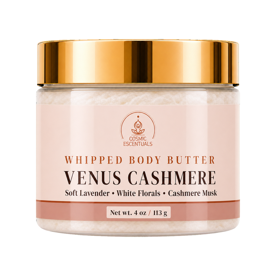Cosmic Essentials Venus Cashmere Whipped Body Butter in a clear jar with a reflective gold lid and a pale pink label, shown on a white background.