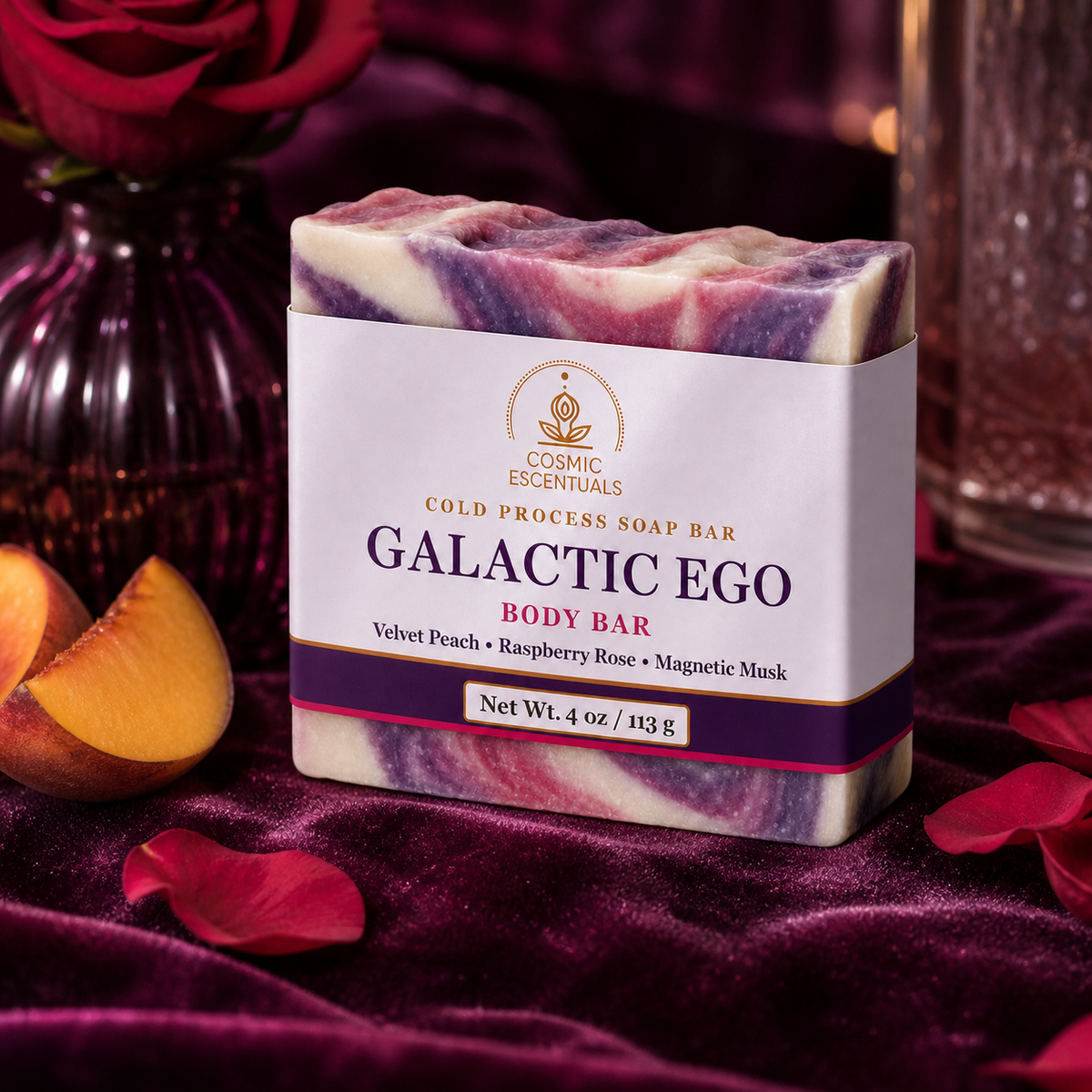 Galactic Ego Body Bar styled with peach, rose petals, and rich plum accents.
